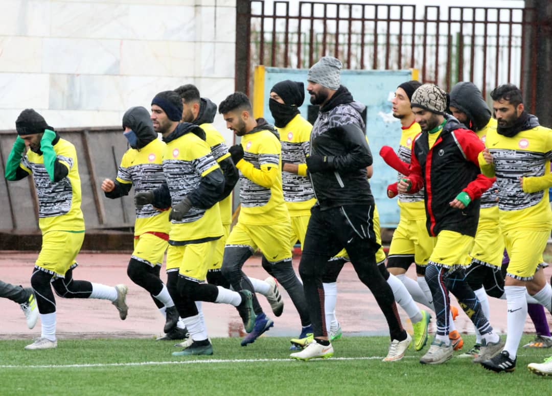 گزارش تصویری از تلاش سرخ پوشان زیر باران